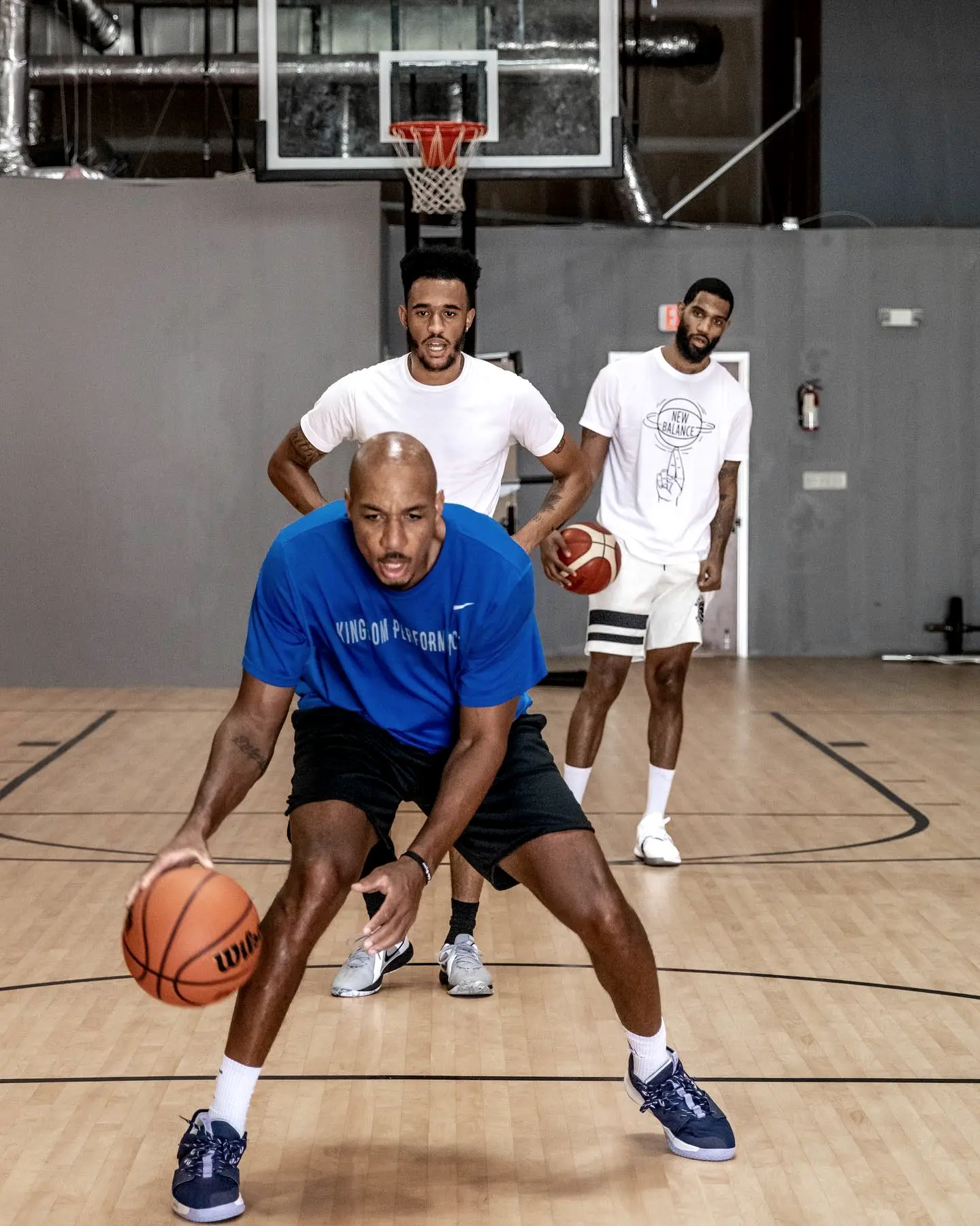 Coach Keith Spencer running a ball-handling drill at Kingdom Performance